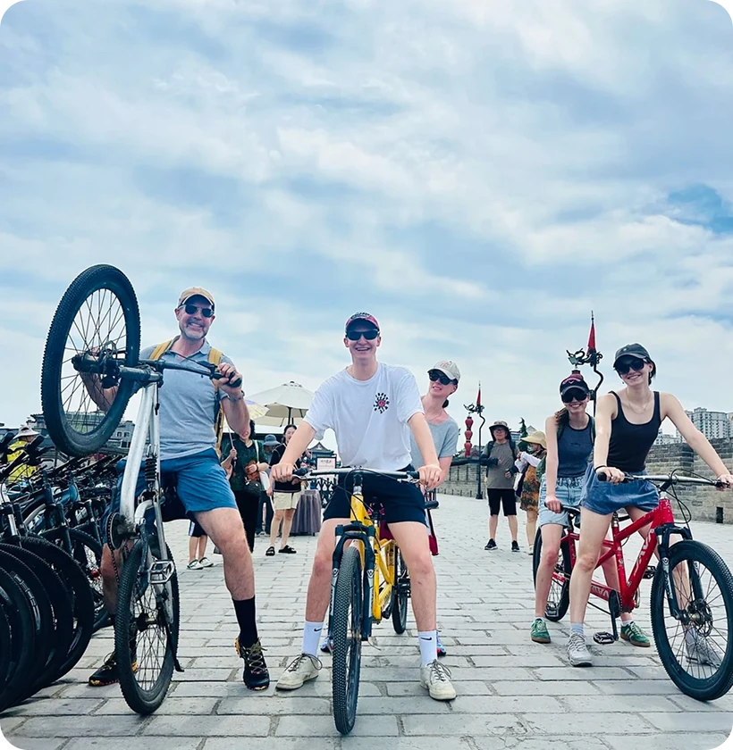 Travelers setting out on a cycling trip in Xi'an
